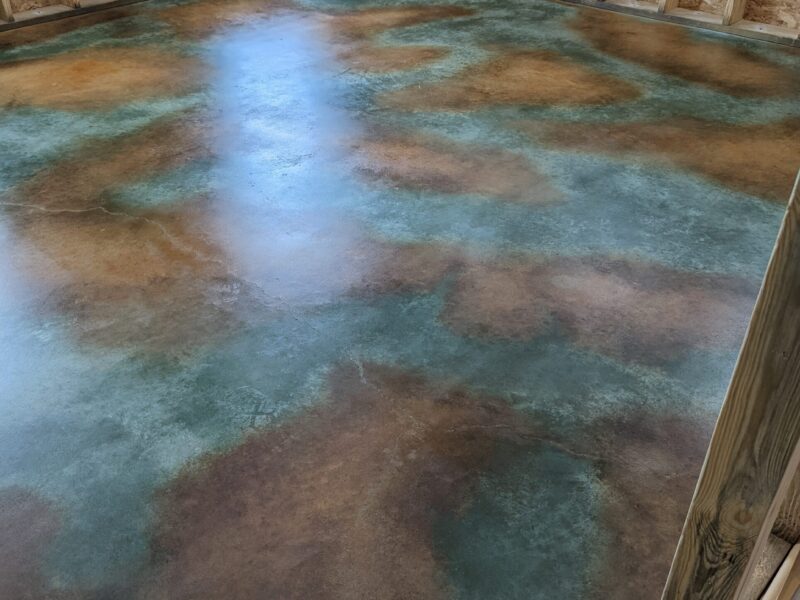 barndominium floor transformed into a stunning, multi-layered and protected surface with acid staining and sealing