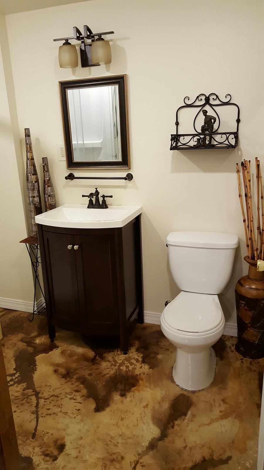 The beautiful, newly-stained bathroom floor is sealed with EasySeal satin for added protection and shine