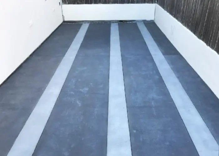 Final Result of Stained Concrete Driveway with a Stunning Design featuring Stormy Gray and Light Slate Color Bands.