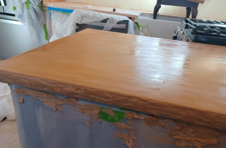 How to concrete countertop applying an integrally colored skim coat of Beachfront Buff concrete overlay on a plywood constructed countertop