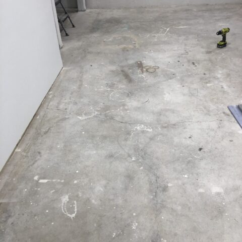 Concrete floor with paint stains