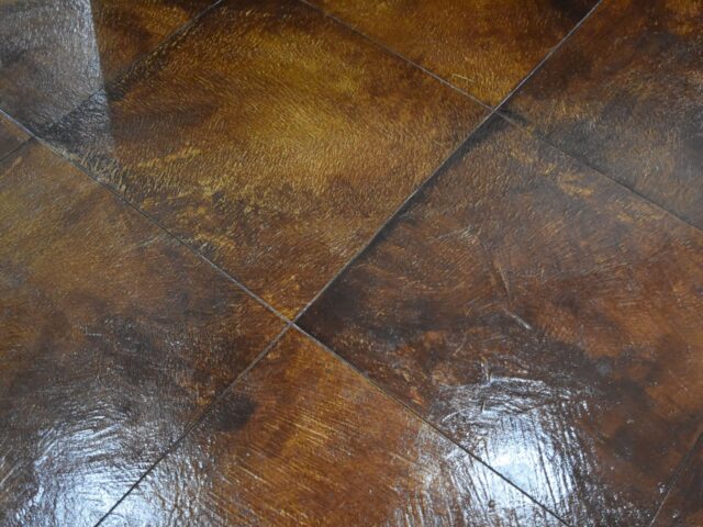 AcquaTint Terra Cotta Stain on Living Room Concrete Floo