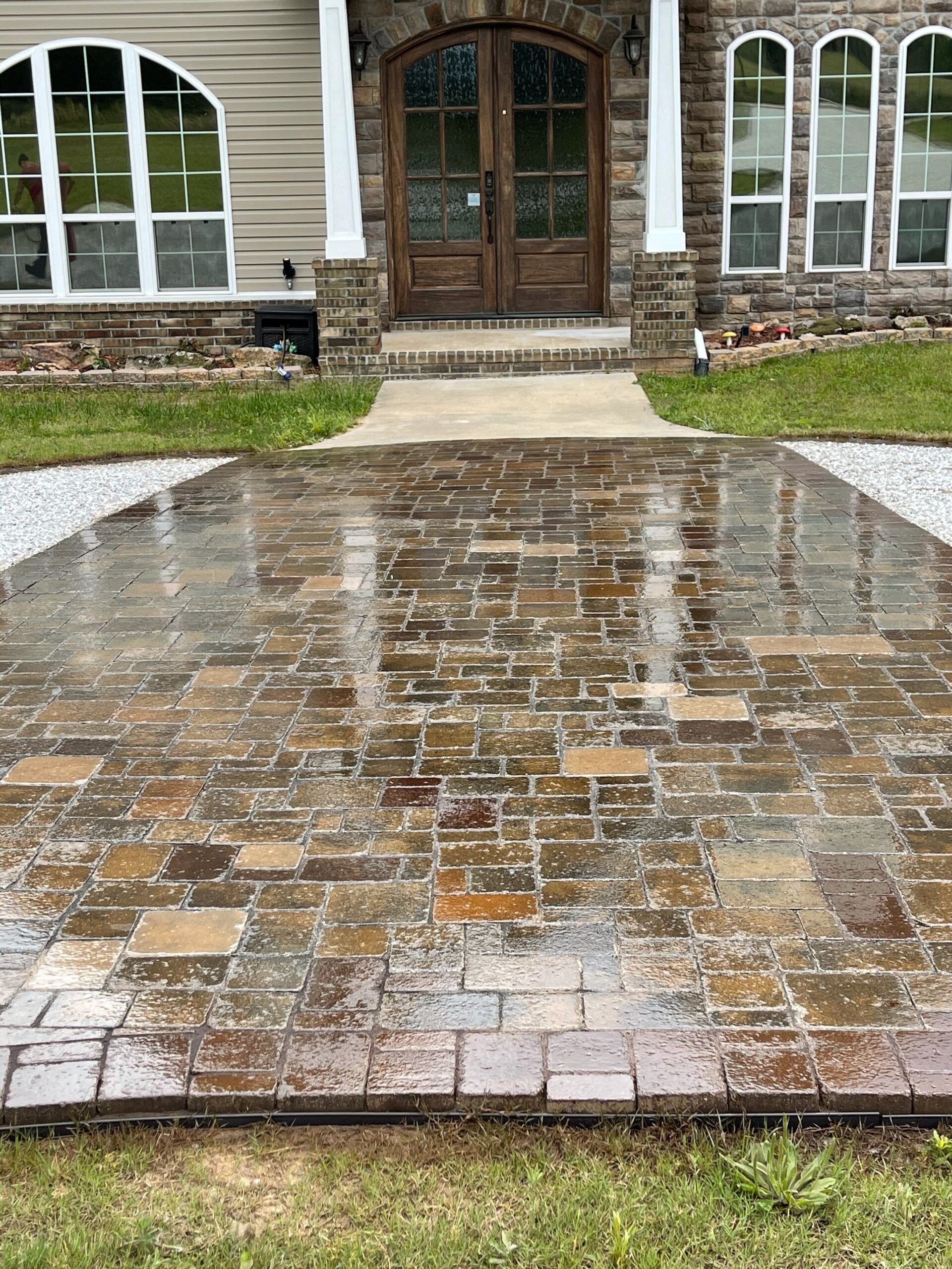 Multicolored paver driveway, featuring a beautiful color design created with Aztec Brown, Driftwood, Khaki, Yukon Gold, and Terracotta concrete stain