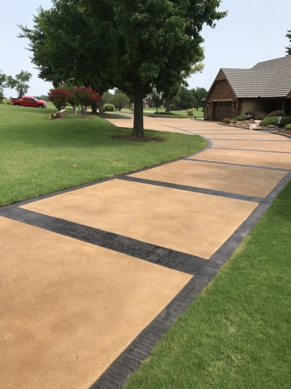 Concrete driveway stained with Yukon Gold Antiquing Stain and Black EasyTint