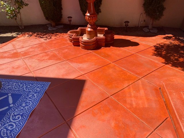 Patio stained with 3 coats of Terracotta concrete stain