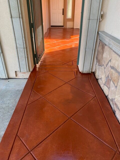 Terracotta stained concrete patio