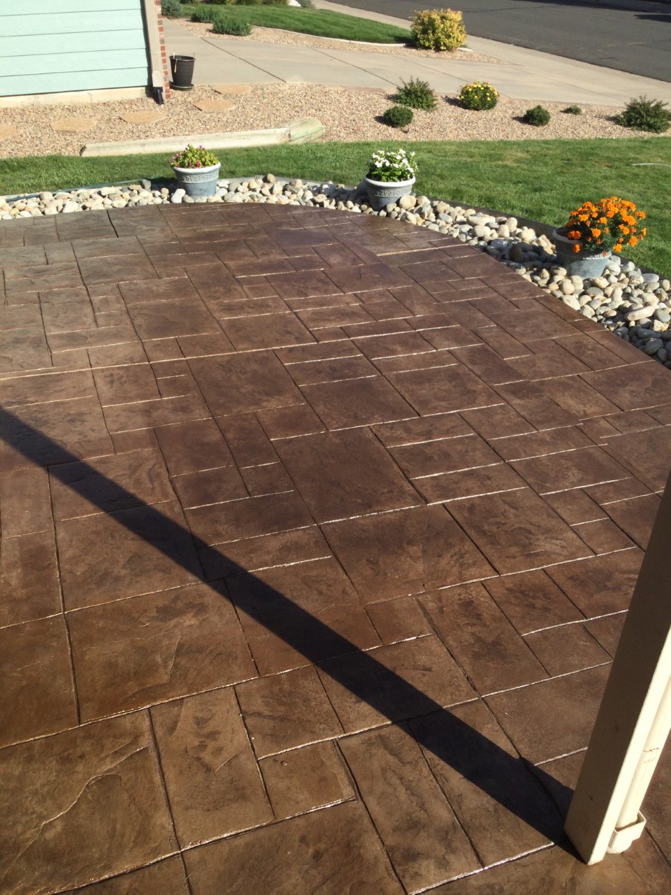 Sealed Driftwood Antiquing stain on previously faded stamped concrete patio