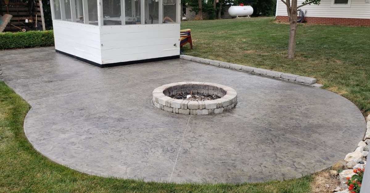 The stamped concrete patio after applying the Light Charcoal Antiquing™ Stain