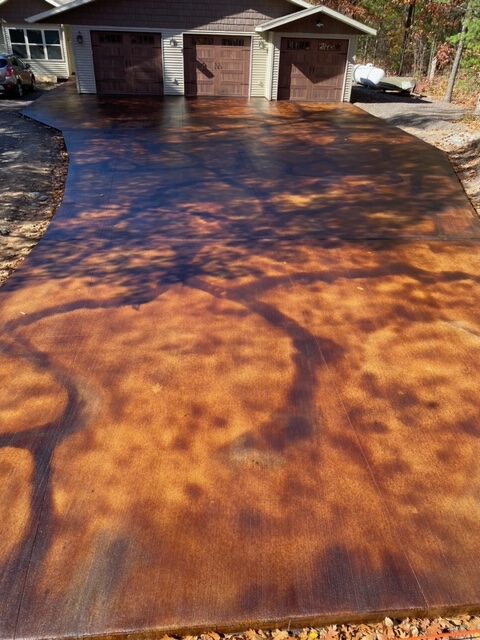 acid stained brushed concrete finish driveway