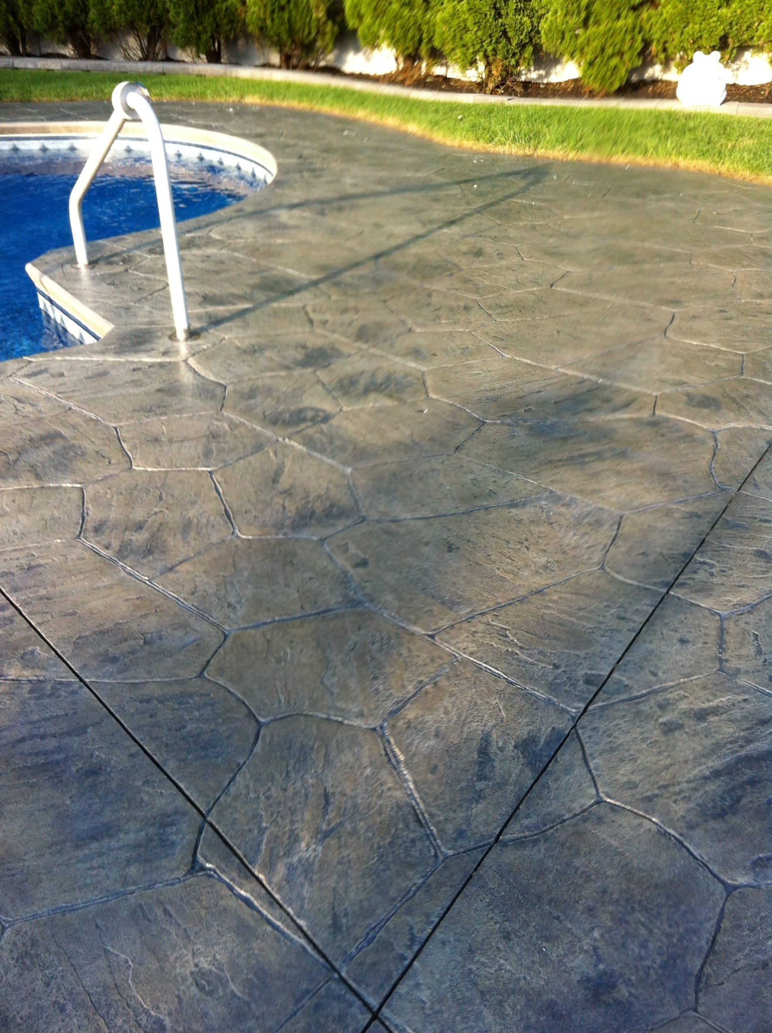 Restored Stamped Concrete Pool Deck