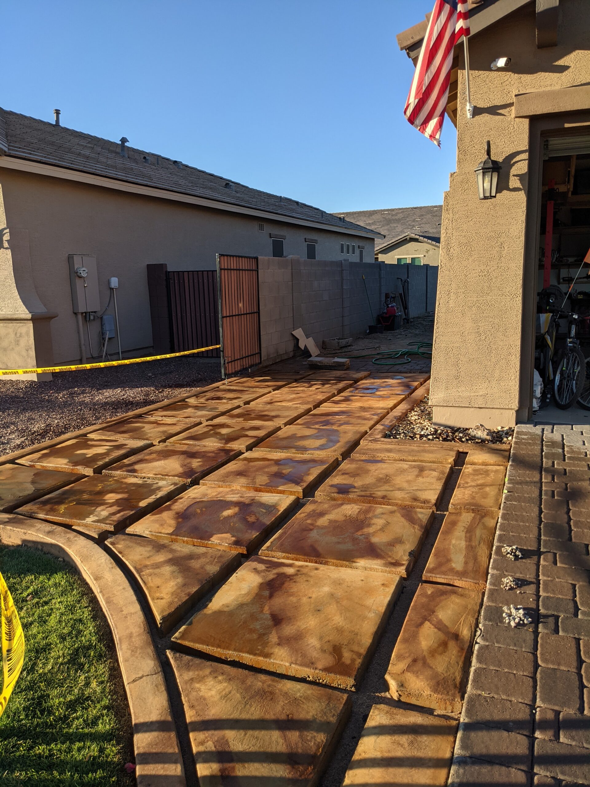 An image of the driveway after applying an additional, heavier layer of Coffee Brown stain