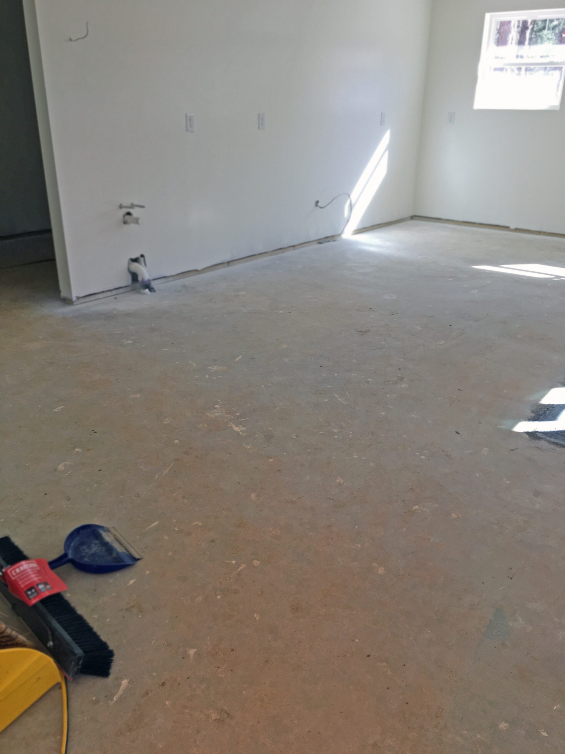 concrete floor in the commercial kitchen before staining