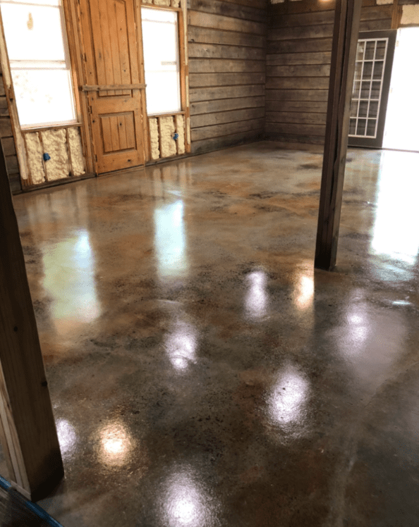 Acid stained log cabin concrete floors