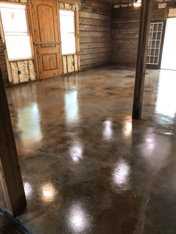 Acid stained log cabin concrete floors