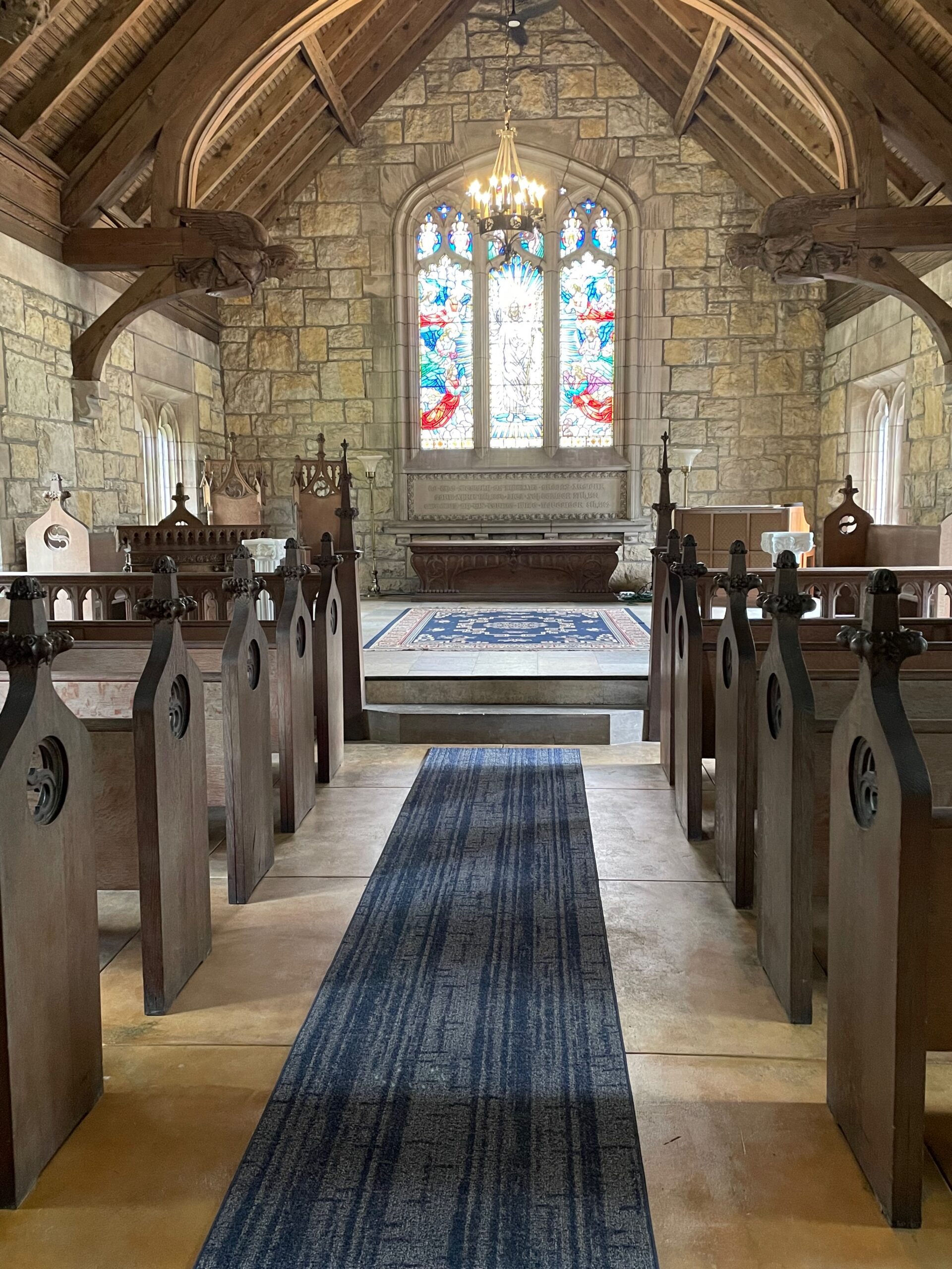 Post-renovation photo of the chapel floor looking towards the altar, stained in Malayan Buff