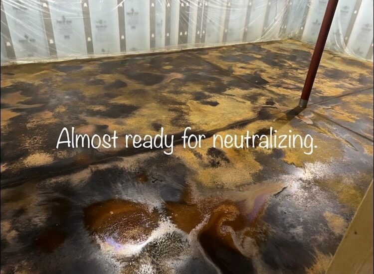 Reaction time process: The Coffee Brown acid stain has been applied over the dried Desert Amber, creating a beautiful layered effect. This photo shows the dry acid stains on the concrete floor before the neutralizing process.