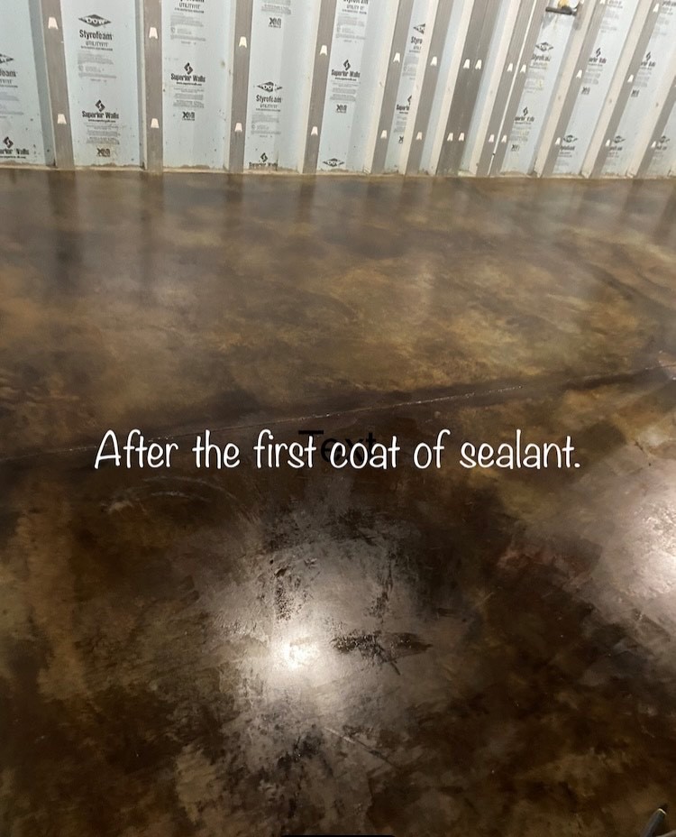 Image of acid stained concrete floor after the first coat of AcquaSeal™, the surface is dry and ready for the next coat of sealer application to protect and enhance the color of the floor.