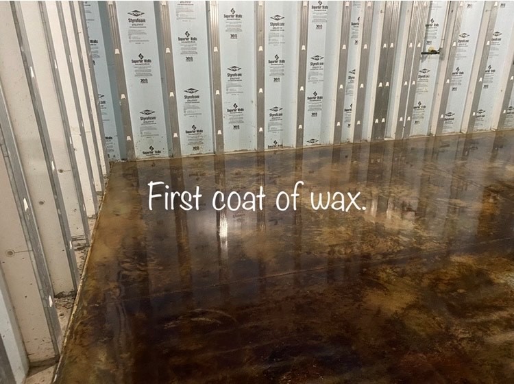 Acid stained and sealed concrete floor after first coat of ProWax Polish™ application