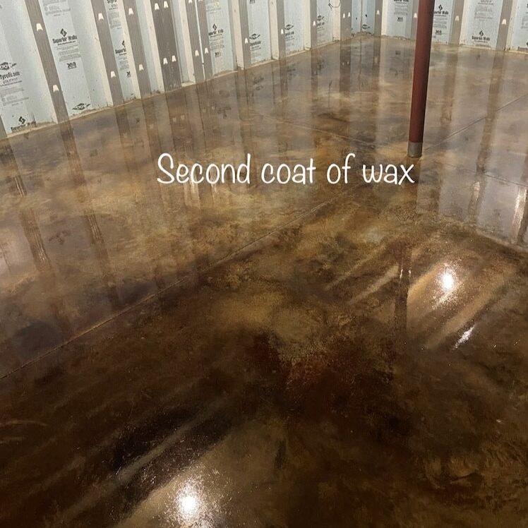 Acid stained and sealed concrete floor after second coat of ProWax Polish™ application