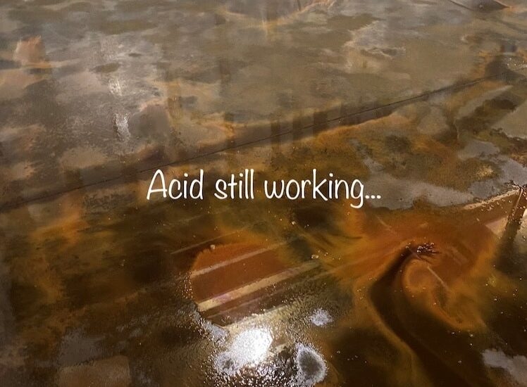 Image of Desert Amber and Coffee Brown acid stains reacting with the concrete floor, creating unique and one-of-a-kind coloring.