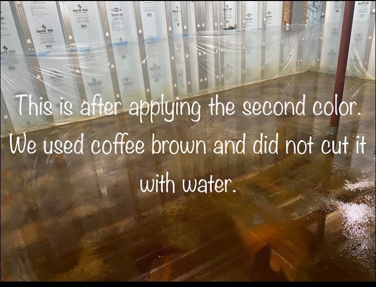 Image of wet Coffee Brown applied over wet Desert Amber acid stain creating a beautiful layered effect while still wet.