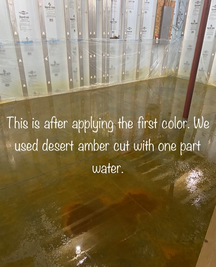 Image of wet Desert Amber acid stain on the surface of a concrete floor