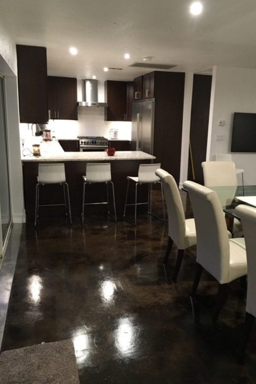 Modern look with black and coffee brown acid stained concrete floors