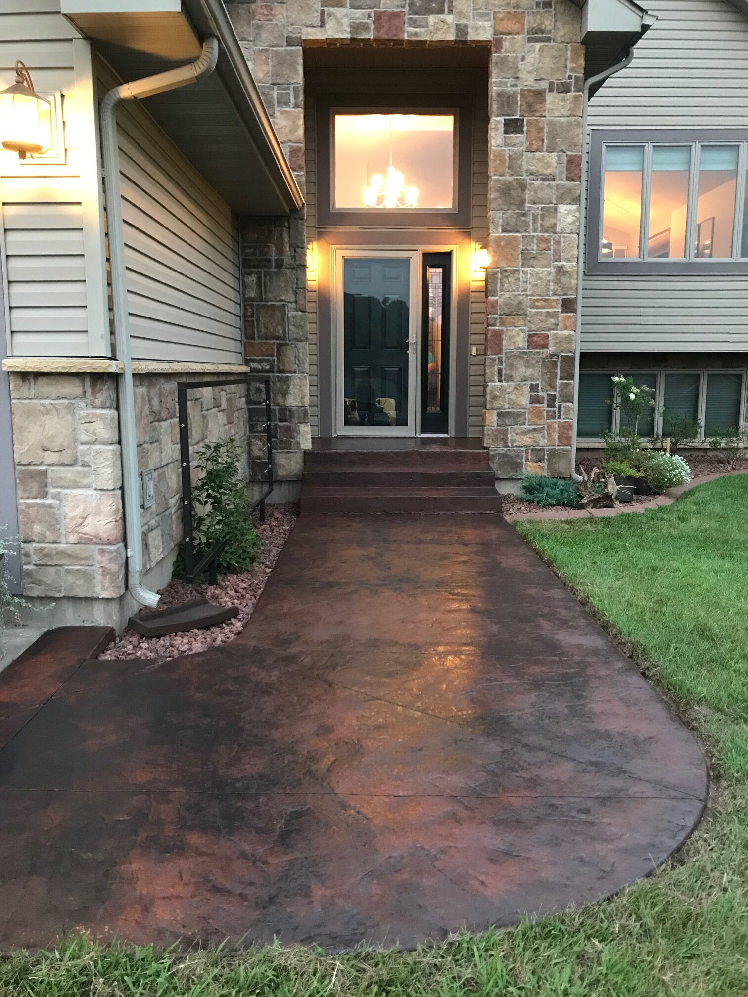 Stained Residential Walkway with Light Charcoal over Old Pink