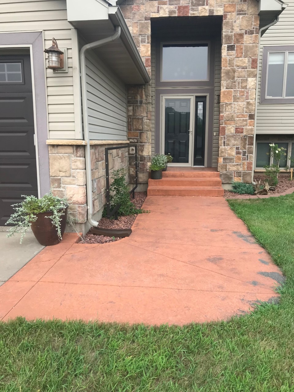 Faded Residential Concrete Walkway Porch