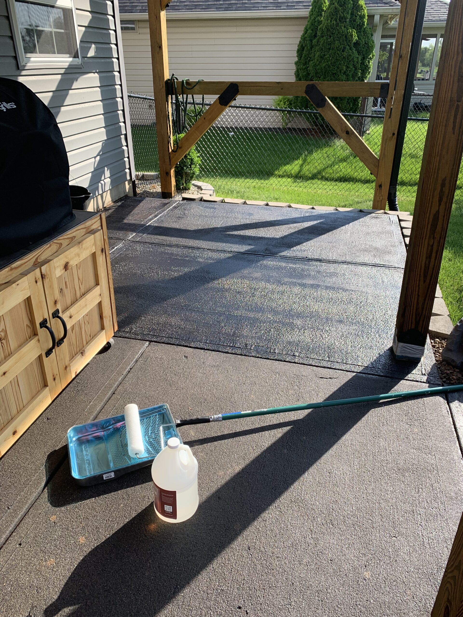 Patio after the second coat application of EasySeal satin sealer with a roller