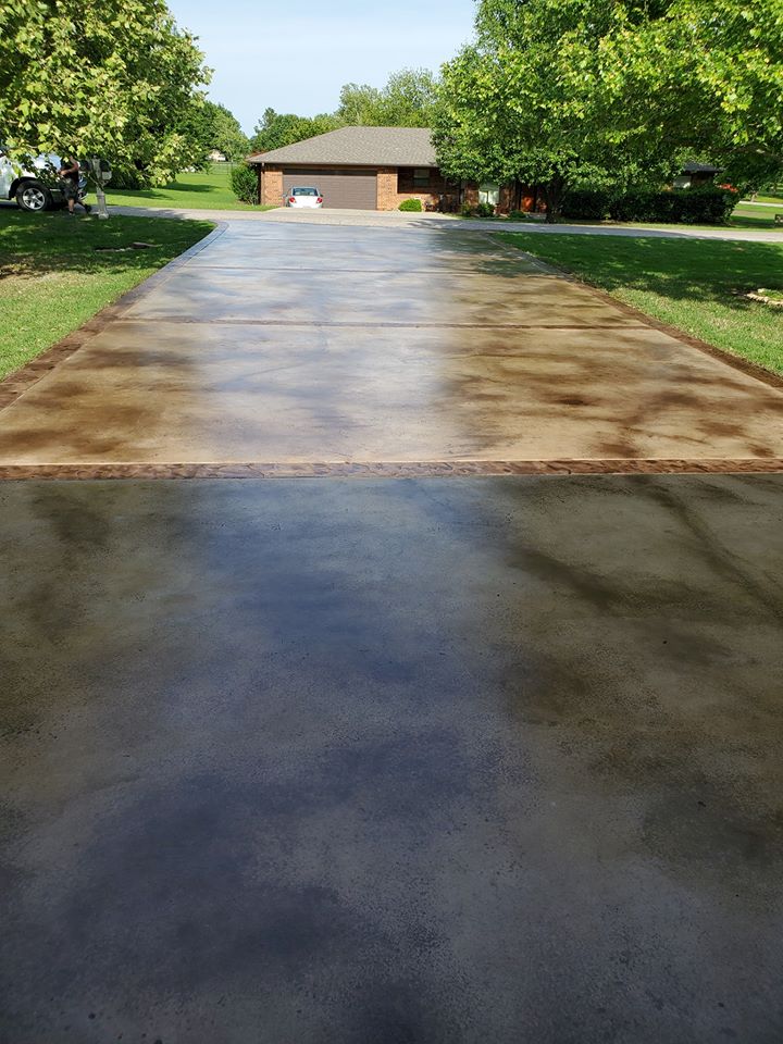 Experience the beauty of a unique, one-of-a-kind driveway with Coffee Brown EverStain Acid Stained Driveway by Kenneth Lazenby.