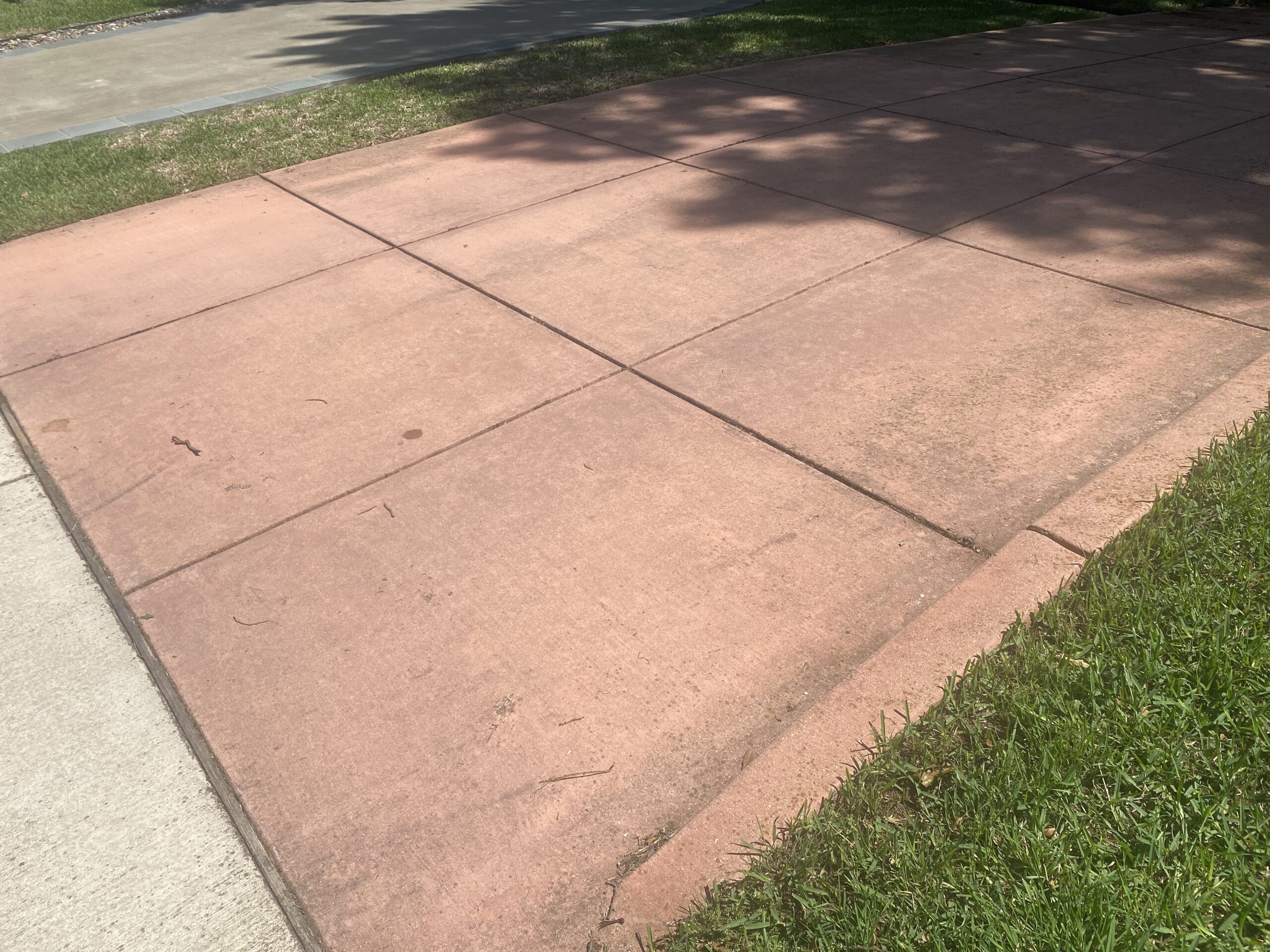 Discolored concrete driveway