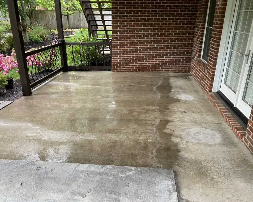 concrete porch prior to staining