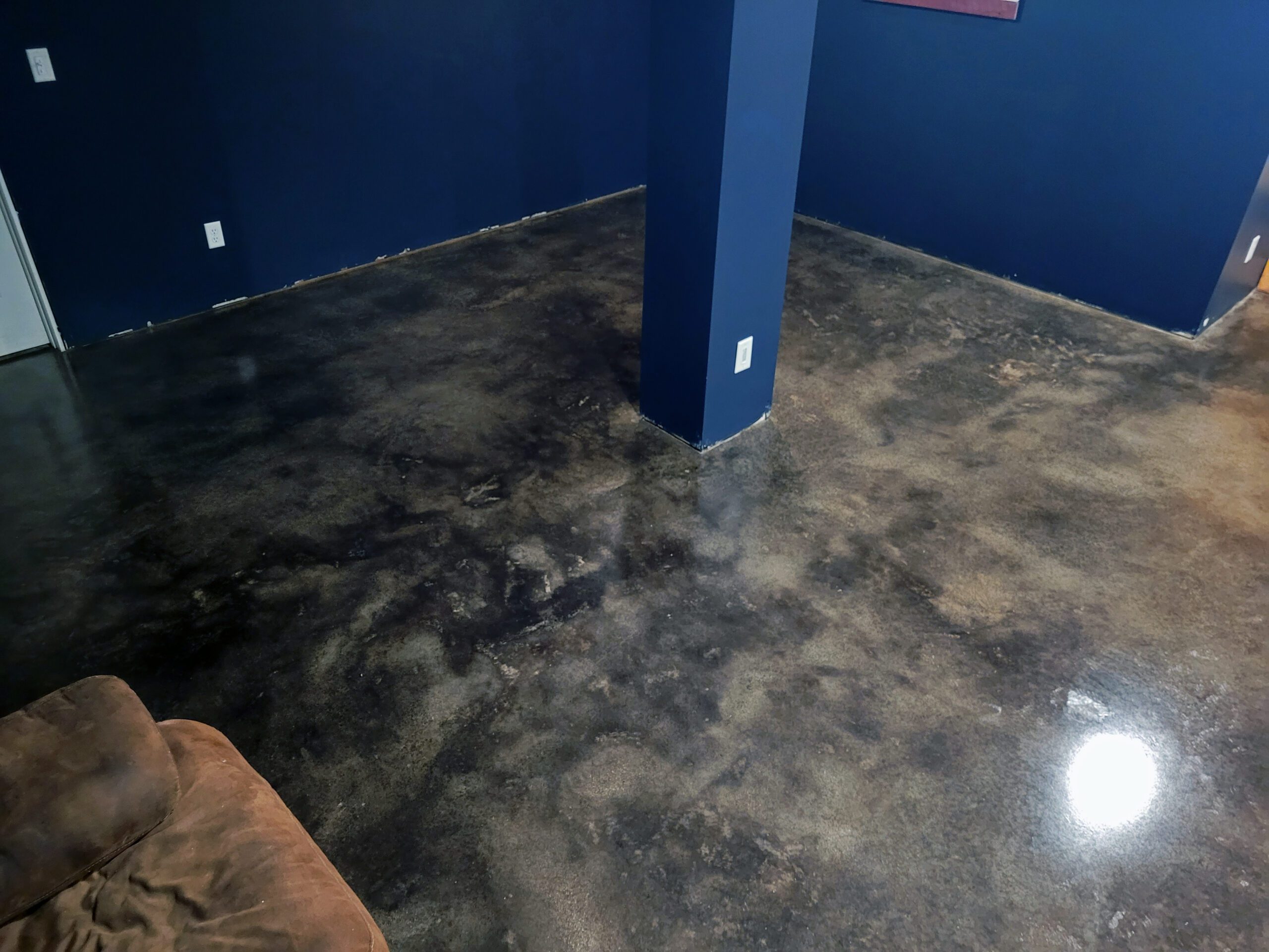 Black acid stained concrete floor