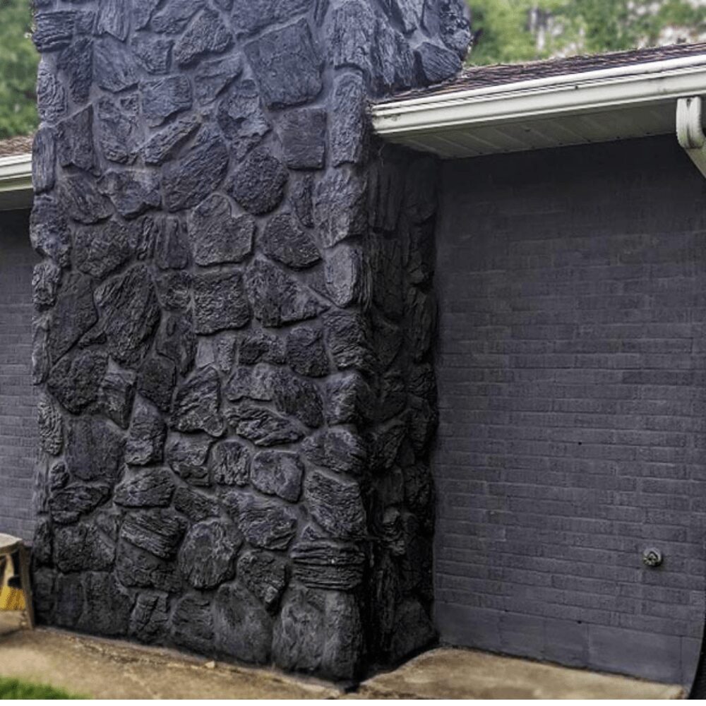 Dark gray limewash brick house finish