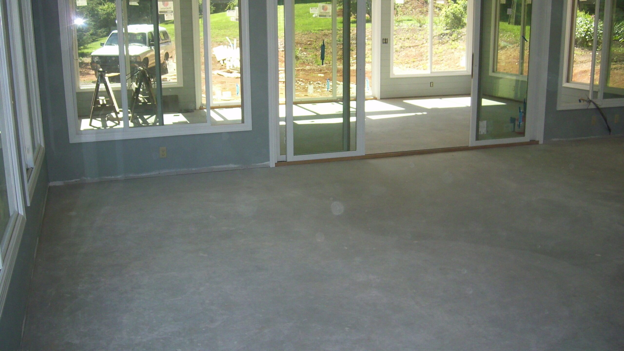 Unfinished concrete sunroom floor