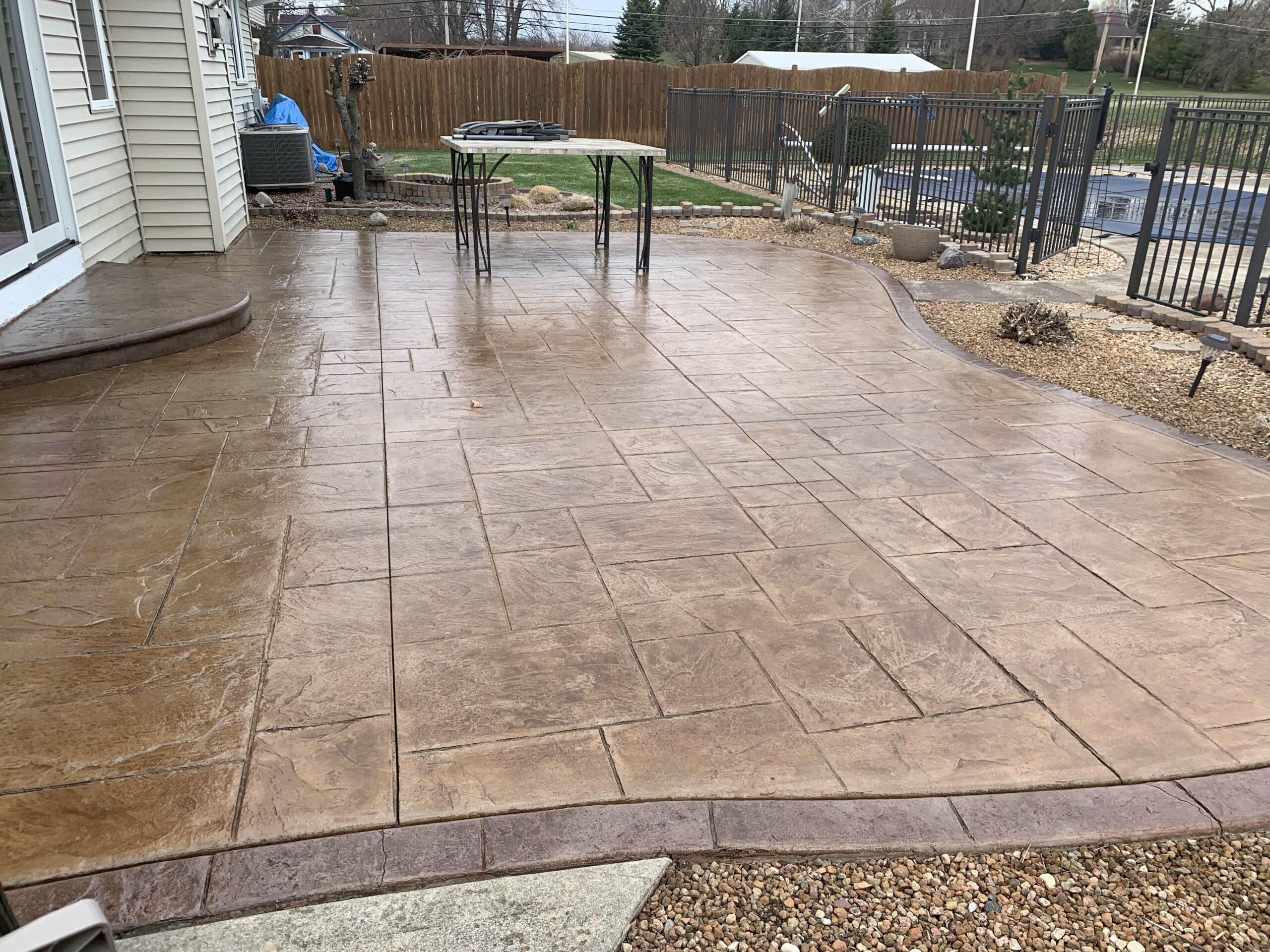 Cafe Royale and Aztec Brown Antiquing Stains on Stamped Concrete Patio