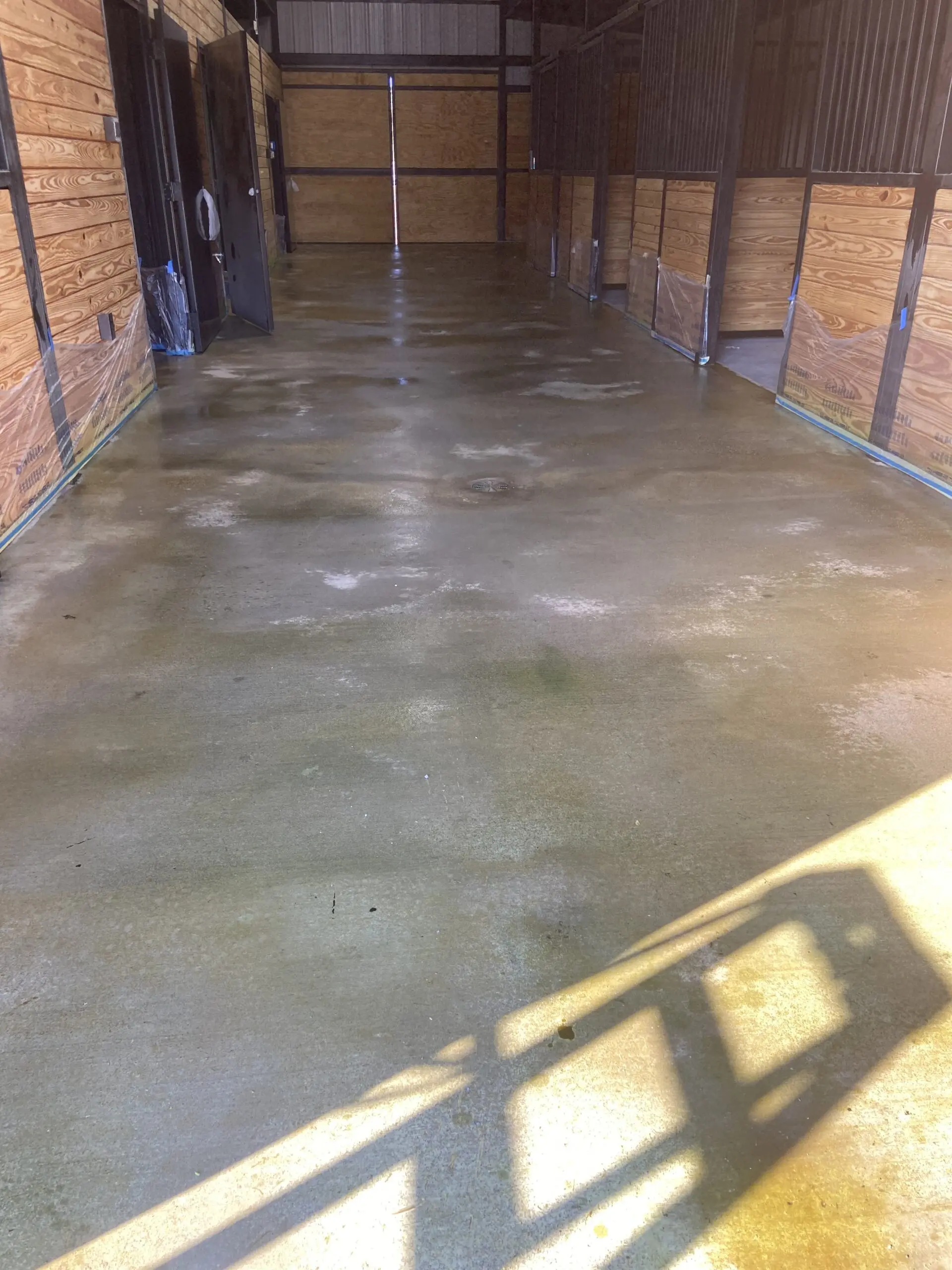 Image showing the cleaned and neutralized stained concrete floor, ready for the next step