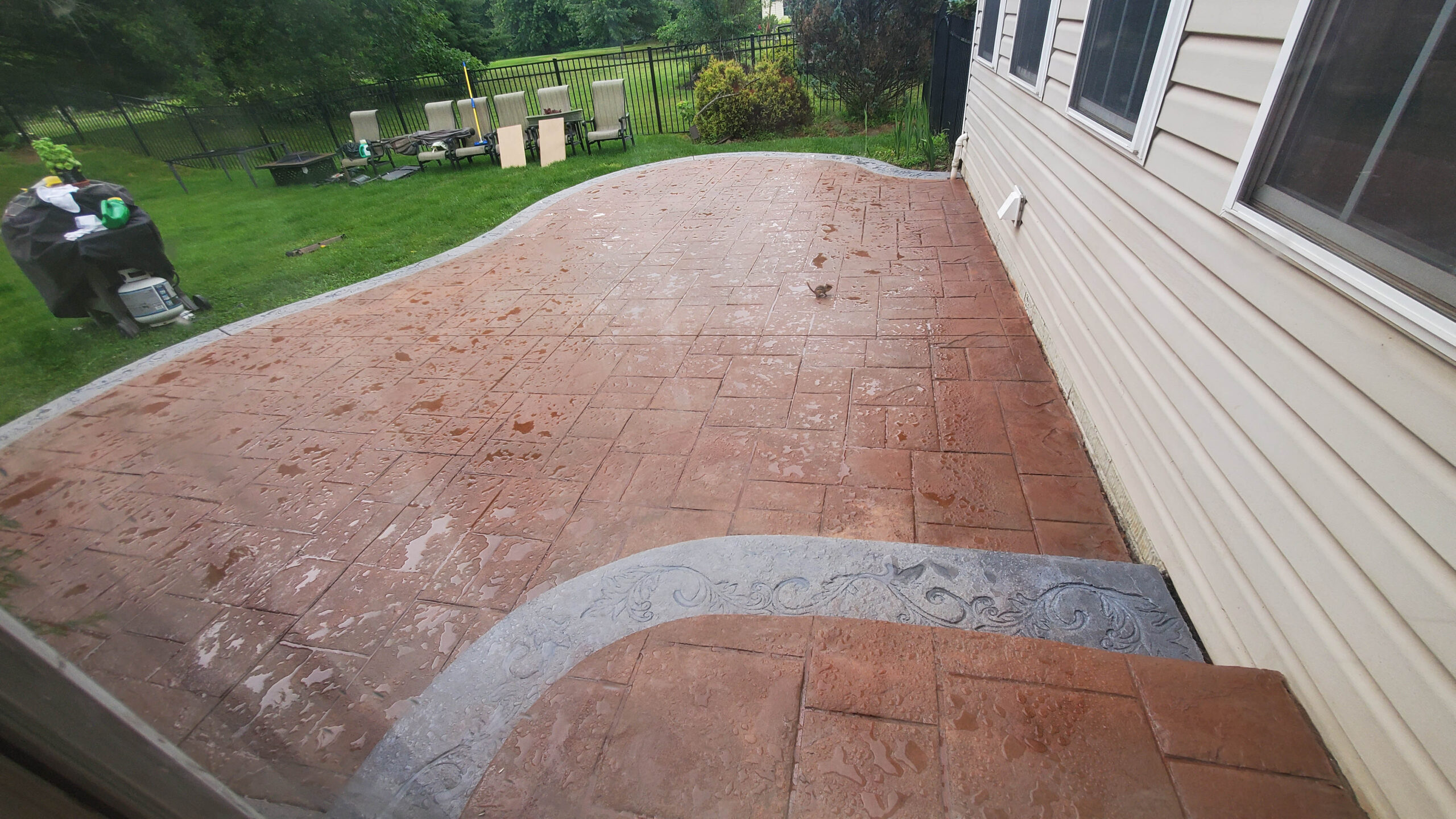 Russet & Eagle Grey Antiquing Stains on Stamped Concrete Patio