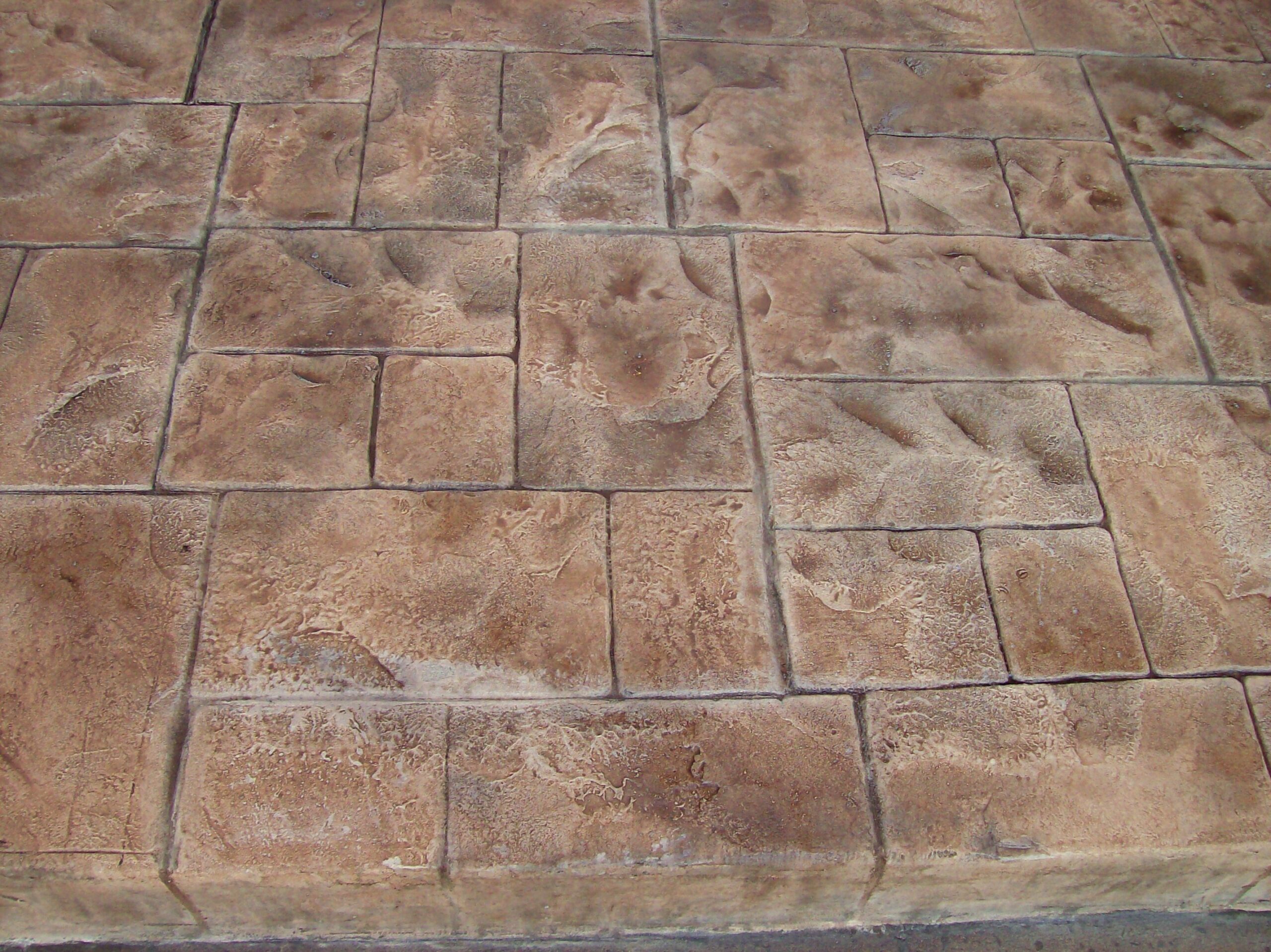 Auburn Antiquing Stamped Patio Auburn Antiquing Stain on Integrally Colored Stamped Driveway