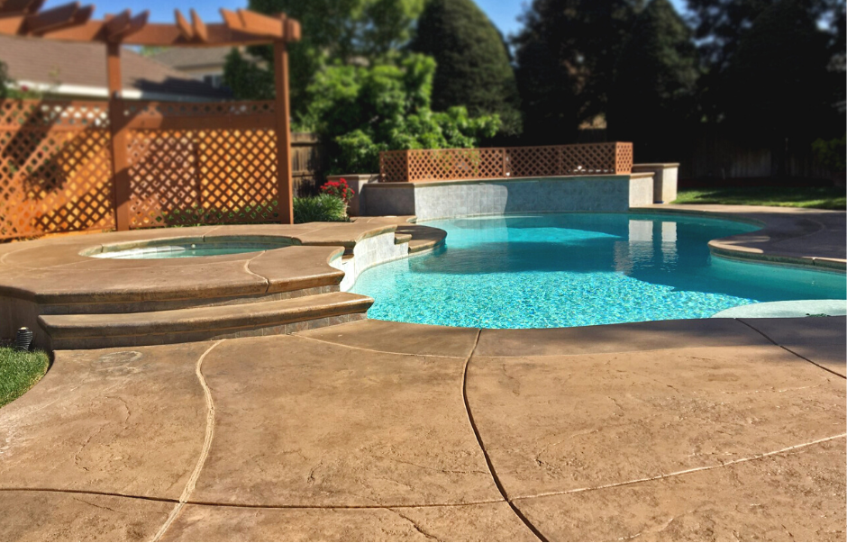 Beautiful stained stamped concrete pool deck