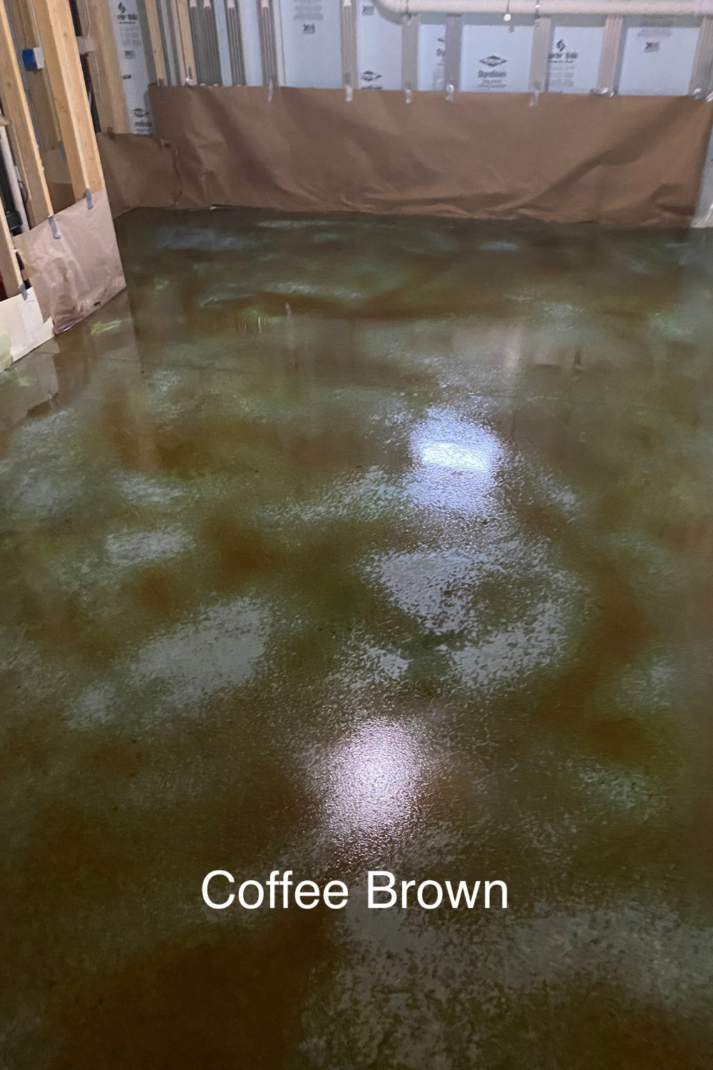 Coffee Brown accent color over a dried Azure Blue acid stained concrete basement floor