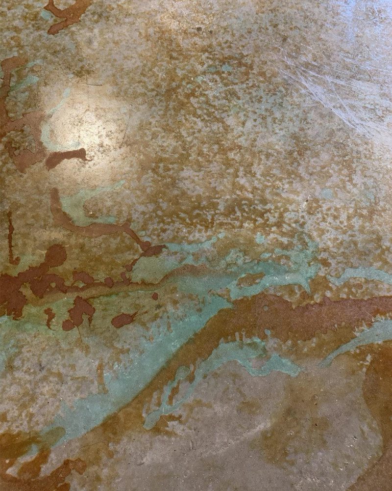 Stained concrete basement floor turned into an art statement
