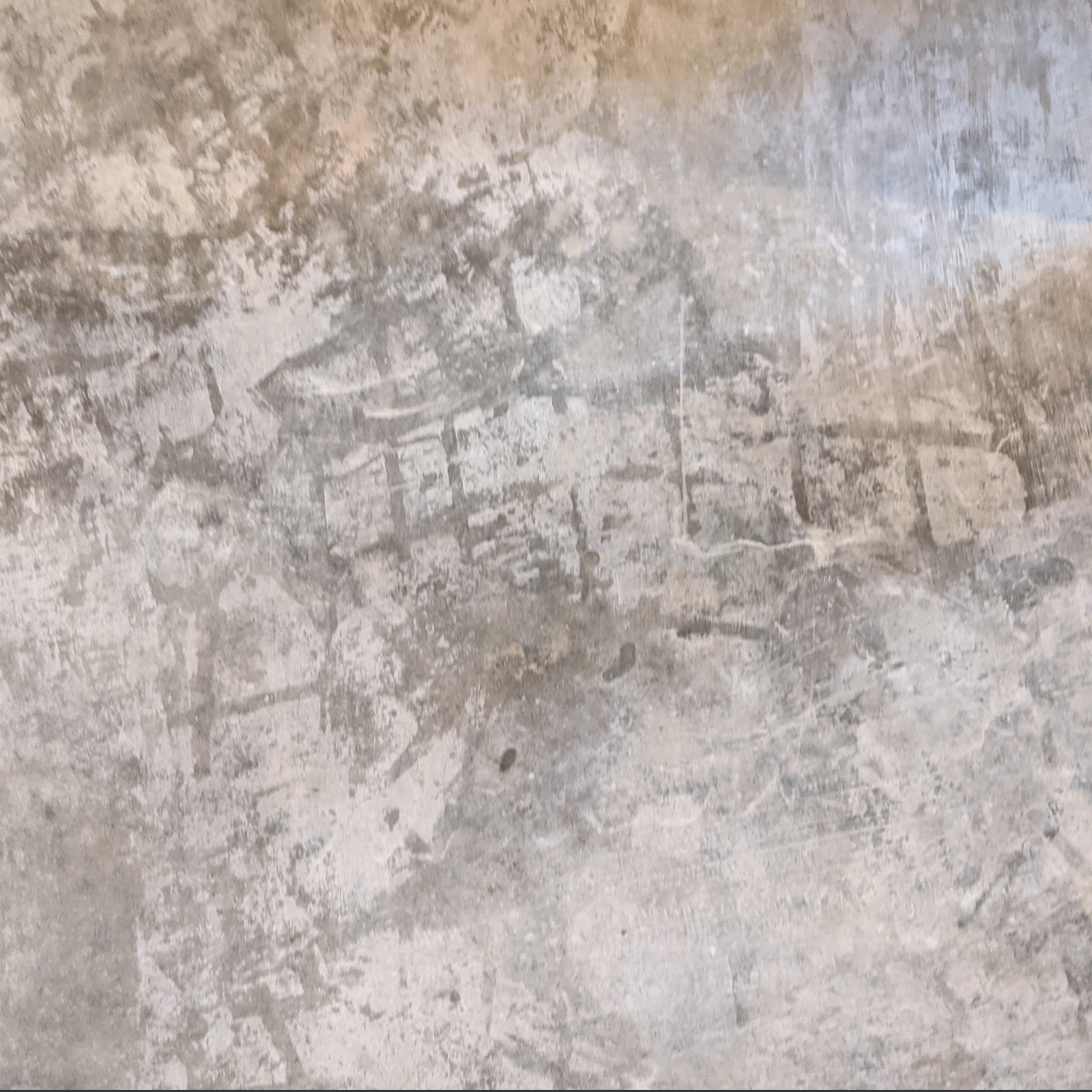 dry-footprints-etching-concrete-floors-before-staining Close-up of etched footprints on dry concrete floor before staining