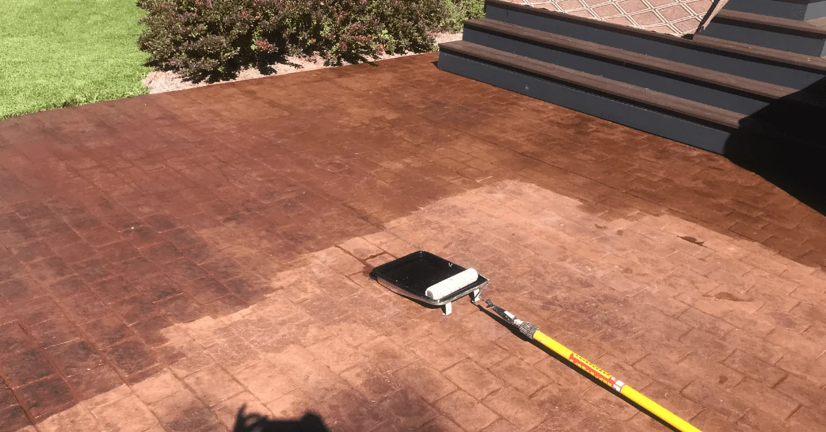 Applying EasySeal™ Gloss to a dull patio using a phenolic core roller