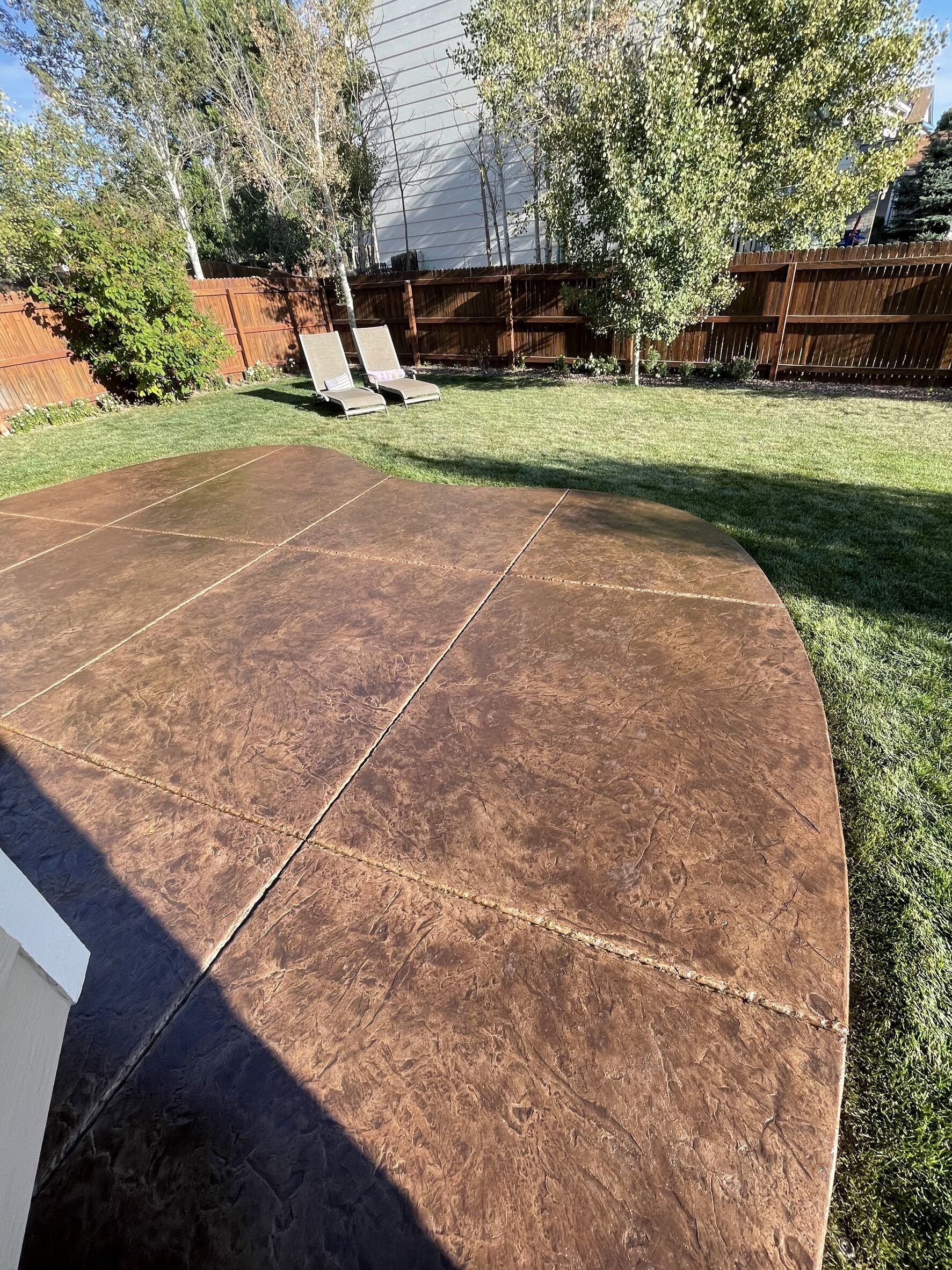 Brown Stained Stamped Concrete Patio - Driftwood Antiquing Stain