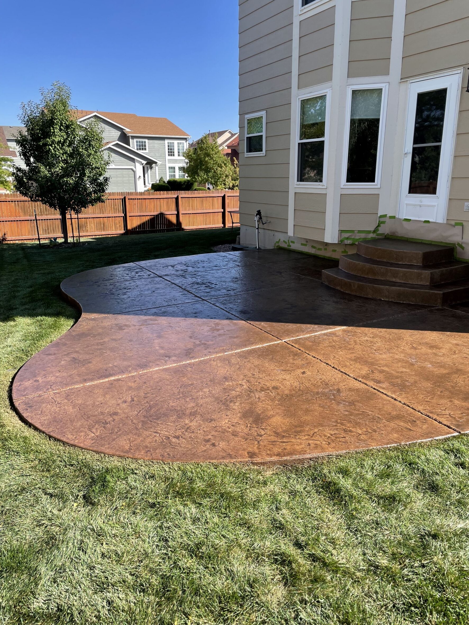 Brown Stained Stamped Concrete Patio - Driftwood Antiquing Stain