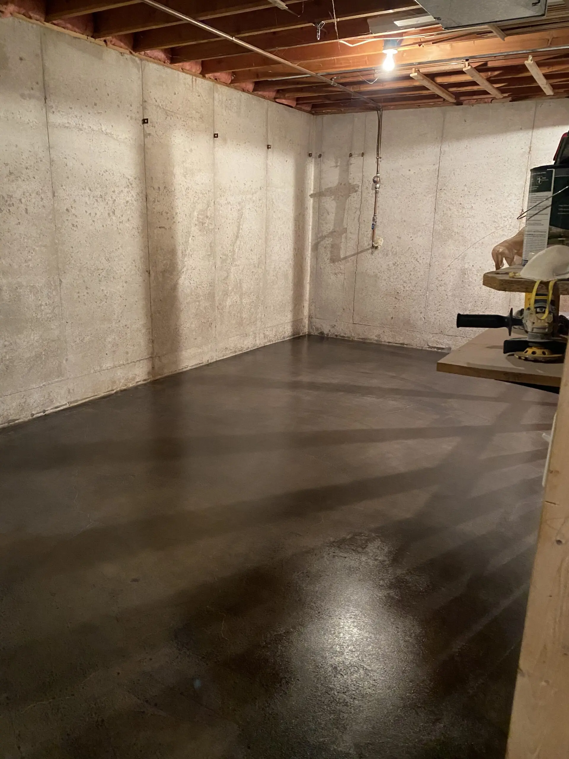 Alternate angle of the transformed basement floor with the natural, nuanced effect of Charcoal AcquaTint