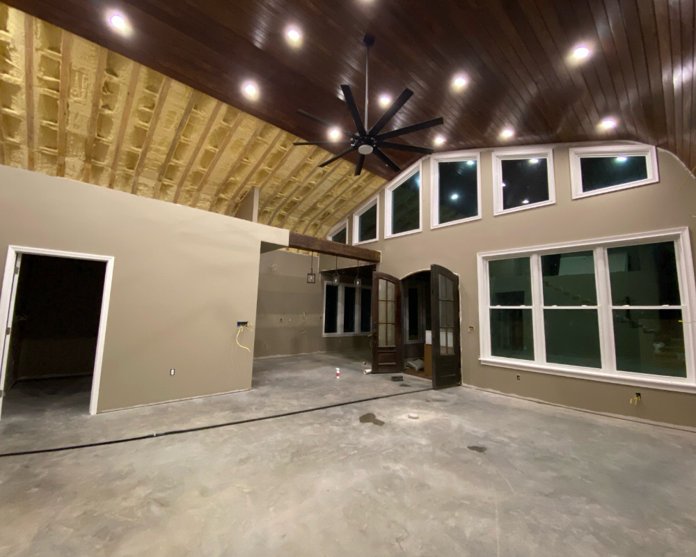 Home interior before renovation with plain concrete floor