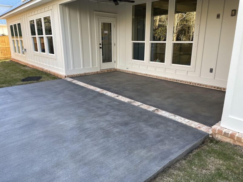 Gray stained broom finish concrete patio